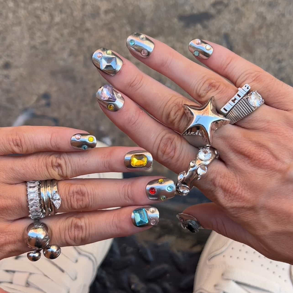 Metallic Treasure press on nails on hand