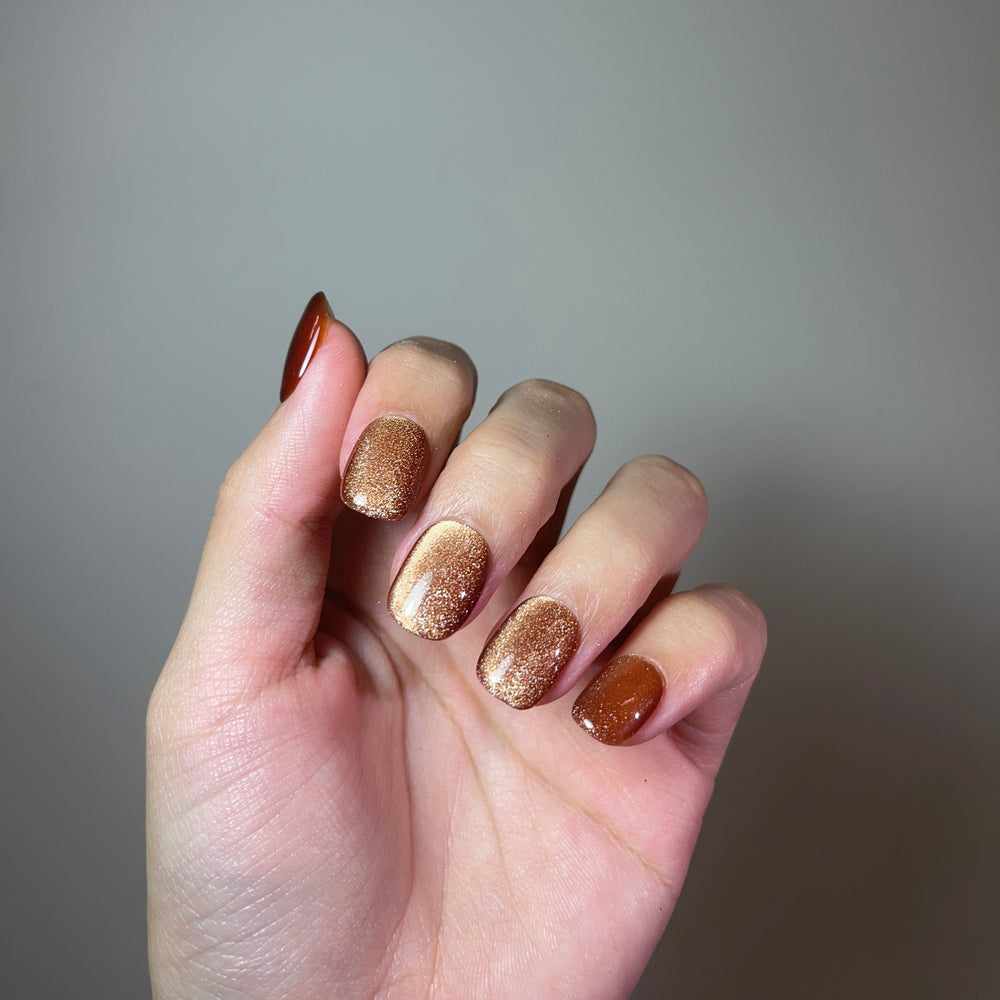 Dark Brown Glass press on nails on hand