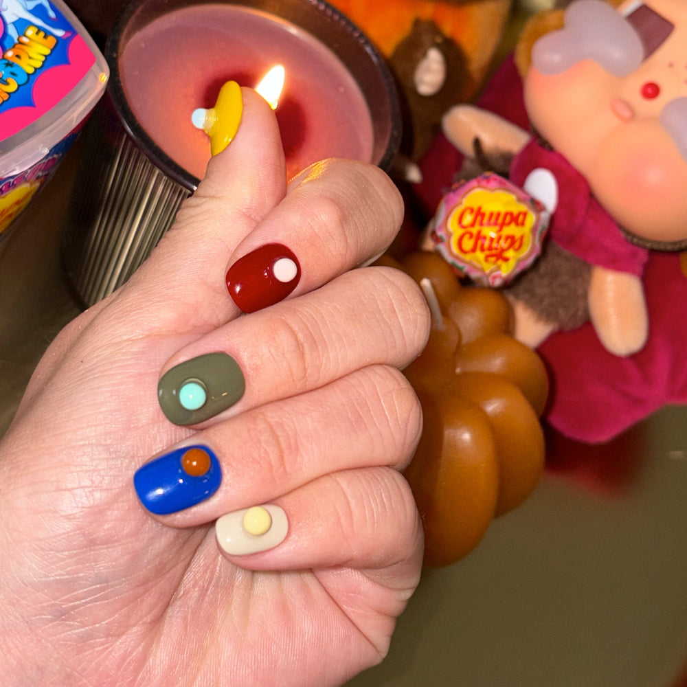 Colorful Dots press on nails on hand